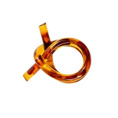 a pair of tortoise shell rings on a white background