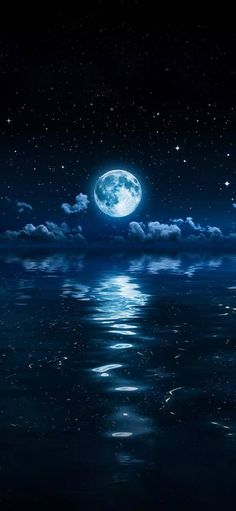 the full moon is reflected in the water at night with clouds and stars above it