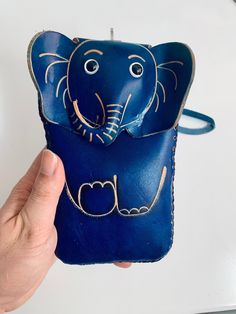 Made by fully leather. It can fit your phone, your keys or your cards.  🔱Follow me and check my commerce page.  I bundle shipping on multiple item purchases! Blue Leather Coin Purse With Interior Card Slots, Leather Elephant Keychain, Broken Zipper, Coin Wallet, Blue Leather, Brown Leather, Follow Me, Elephant, Handbags