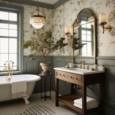 a bath room with a tub a sink and a mirror