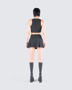 Have them standing up straight when you walk in wearing this two-piece set 🖤 Featuring a black suiting cropped vest top paired with a matching pleat mini skirt - this fit will make it clear that you mean business, in the best way possible 😏 Fitted Short-length Crop Top For Night Out, Fitted Short Length Crop Top For Night Out, Edgy Fitted Skort For Workwear, Edgy Fitted Pleated Skirt For Parties, Edgy Pleated Skirt For Party, Fitted Black Crop Top For Workwear, Edgy Fitted Mini Skirt For Work, Black Fitted Crop Top For Work, Black Sleeveless Crop Top For Work