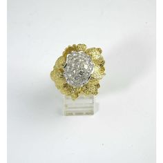 Impressive Ring with 2.25c atw. of beautiful diamonds set among textured 18k yellow gold petals.  US size 6 (it might a tiny bit off because of the balls to keep it from flipping)  It can be sized.  The ring measures 1.15" wide by 1.07" tall by .77" deep. Exquisite Gold Diamond Cluster Ring, Gold Dome Wedding Ring With Pave Setting, Formal Yellow Gold Diamond Flower Ring, Heirloom Diamond Flower Ring In Yellow Gold, Luxury Yellow Gold Hallmarked Flower Ring, Luxury Yellow Gold Flower Ring With Rose Cut Diamonds, Yellow Gold Diamond Cut Flower Ring, Formal Yellow Gold Flower Ring With Single Cut Diamonds, Luxury Yellow Gold Flower Ring For Anniversary