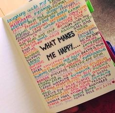 a notebook with writing on it that says what makes me happy