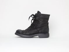 "grained leather combat boots in black. round toe. thick heavy duty soles produced by Italian company, Silga. label: n/a material: leather condition: excellent - has a whitish mark on the left toe box, some wear to the back of heels size: 37 (EU), fits true to size insole 9.75\" ball of foot 3.75\" heel 1.25\" outsole 10.5\" shaft height 5.5\" *PLEASE PROVIDE CONTACT NUMBER UPON CHECKOUT, THANK YOU!*" Combat Boots With Reinforced Toe And Lace-up, Lace-up Leather Combat Boots With Stitched Sole, Military Leather Combat Boots With Round Toe, Black Lace-up Combat Boots With Metal Feet, Black Leather Combat Boots With Lace-up Fastening, Leather Combat Boots, Womens Booties, Booties Ankle Boots, Boot Shoes Women