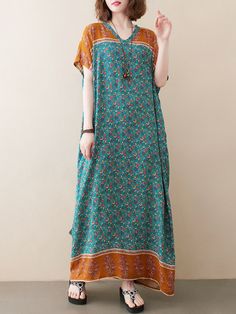 Sku CY-!86933 Material >70%Cotton Style Loose , Batwing Sleeves Feature Floral Printed , Contrast Color Neckline V-neck Occasion Casual , Simple , Vintage Seasons Summer Type Maxi Dresses Color GREEN Size FREE SIZE Please consult the size chart we provide for this item's measurements to help you decide which size to buy.Please note: There may be 1-3cm differ due to manual measurement.CMINCH Bust Length FREE SIZE 150 130 Cap Sleeve Shirt, Maxi Dress Green, Batwing Sleeve, Bat Wings, Floral Printed, Cotton Style, Half Sleeves, Contrasting Colors, Free Size