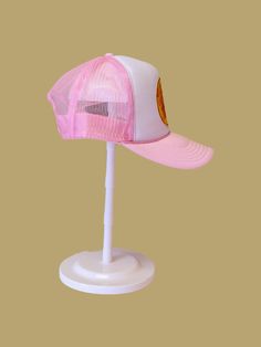 Otto pink and white mesh trucker hat with durable adjustable snapbackSoft and comfy terry cloth sweatbandPremium foam fabric Cheap Pink Trucker Hat For Outdoor, Pink Sporty Cap, Sporty Pink Cap, Sporty Pink Trucker Hat With Curved Brim, Sporty Pink Baseball Cap With Curved Bill, Sporty Pink Trucker Hat, Pink 5-panel Sports Hat, Pink Baseball Cap With Curved Bill For Streetwear, Pink Trucker Baseball Cap