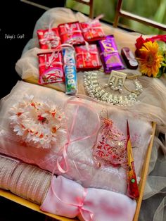 candy, candies and flowers are laid out on a table