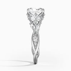 an intricately designed engagement ring with diamonds