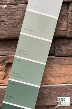 the shades of gray and green are used in this color scheme for wood paneling