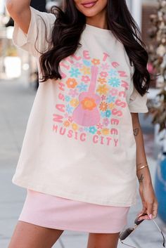 Experience the magic of Music City with our Payson graphic tee! Show off your love for music and the vibrant city life with this stylish graphic tee. Made with high-quality materials and a comfortable fit, this tee is perfect for concerts, festivals, or everyday wear. Join the music revolution and get your Payson tee today! Material:62% Polyester+32% Cotton+6% Elastane Model info: Models are 5'7", Size 2, wearing smalls Size Chart (INCH) Sizes Bust Hem_Width Shoulder Sleeve_Length Length Relax Relax Relax Relax Relax S 39.0 41.3 15.7 7.1 25.6 M 40.9 43.3 16.2 7.5 26.4 L 42.9 45.3 16.7 7.9 27.2 XL 46.1 48.4 17.5 8.3 28.0 2XL 49.2 51.6 18.3 8.7 28.7 Casual T-shirt For Spring Concert, Groovy Cotton Tops For Streetwear, Casual Summer T-shirt For Concerts, Spring Concert Tops With Front Print, Urban Style Summer Tops For Concerts, Spring Concert Top With Front Print, Trendy Screen Print T-shirt For Music Festival, Groovy Summer T-shirt With Letter Print, Trendy Festival T-shirt With Graphic Print