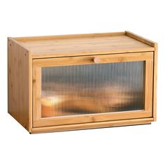 a wooden box with a glass door on top