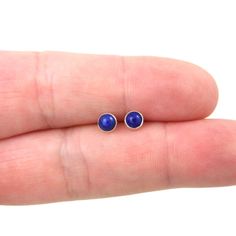 A great pair of Lapis Lazuli Stud earrings. These earrings are made of sterling silver and the stone measures 4 mm. Mix and match with my other stud earrings Includes sterling silver earring backs. Great for sensitive ears! This listing is for one pair of earrings Earrings are shipped in a gift box. *Please note as with all natural gemstones the color may vary from the pair shown. Dainty Blue Round Earrings, Dainty Hypoallergenic Blue Earrings, Dainty Blue Hypoallergenic Earrings, Tiny Blue Minimalist Earrings, Blue Minimalist Hypoallergenic Earrings, Minimalist Hypoallergenic Blue Earrings, Minimalist Blue Everyday Earrings, Dinosaur Earrings, Lapis Earrings