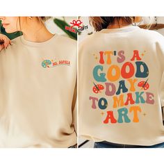 It's A Good Day To Make Art Sweatshirt, Art Teacher Comfort Color Shirt, Art Teacher Gift, Art Lover Shirt, Artist Gifts, Gifts for Teachers. It's A Good Day To Make Art, Art Student, Art teacher, teacher gift, artist, comfort color tee, Funny Art Lover, Teacher Shirt, Artist T-shirt, Art Shirt ---------- PRODUCT DETAILS ---------- - Discover the timeless appeal of Comfort Colors® with the C1717 garment-dyed t-shirt, boasting a vintage aesthetic and a comfortable, relaxed fit. - Crafted from 100 Artistic Graphic Print Top As A Gift, Artistic Graphic Print Tops As Gift, Artistic Graphic Print Top As Gift, Artistic Multicolor Tops With Custom Artwork, Artistic Graphic Print Art With Relaxed Fit, Artistic Custom Cotton Artwork, Custom Artwork On Cotton For Art Collection, Artistic Graphic Print Art As Gift, Artsy Cotton Art For Artistic Expression