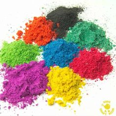 several different colored powders sitting on top of each other