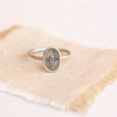 A kiss from the sun.  Full of life and warmth. This sweet stamped silver ring is perfect alone or stacked with other rings. Sterling silver.  Please select your ring size during checkout.Your jewelry will arrive beautifully gift wrapped in a small box. Multiple items will be combined, unless separate boxes are requested. If this is a gift being shipped directly to the recipient, please let me know. I will be glad to include a note from you.Want to see more of my work? Click here to return to my Sterling Silver Sun Design Ring For Gift, Sterling Silver Ring With Sun Design For Gift, Silver Dainty Stamped Ring, Dainty Stamped Silver Rings, Sterling Silver Sun Design Ring, Spiritual Silver Stackable Rings For Everyday, Silver Spiritual Stackable Rings For Everyday, Sterling Silver Ring With Sun Design, Silver Sterling Sun Design Ring