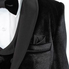 Soft velvet creates a comfortable feel to this tuxedo's suave fit and easy to wear design. A double-breasted vest and satin detailing make it a luxurious take on the traditional black-tie look, great for maintaining a formal look for your little one. Kids' 3-Piece Tuxedo 70% Polyester, 30% Viscose Fabric Shawl Lapel Single-Breasted, Single-Button Jacket Double-Breasted, U-Shaped Vest 3 Button Cuffs Dry Clean Only Made For Children Imported Fitted Velvet Tuxedo For Black-tie Events, Black Tuxedo Velvet Bow Tie, Black-tie Tuxedo With Single Breasted Design, Tuxedo Satin Bow For Black-tie Events, Satin Bow Tuxedo Ties For Black-tie Events, Kid Tuxedo, Double Breasted Vest, Viscose Fabric, Formal Looks