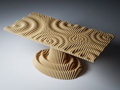 a wooden table with wavy lines on it