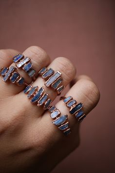 Multi-Stone Kyanite Ring | Kyanite Copper Ring | Copper Blue Kyanite Ring | Goddess Ring | Bohemian Stone Ring | Raw Stone Ring You will receive a similar ring to the ones photographed above. This Multi-Raw Kyanite Ring is unique and one of a kind. The copper delicately accents the raw Kyanite stones and brings out its cobalt blue beauty. All our rings are formed with copper around the stone using a process that can take anywhere from 8 to 32 hours. Once that is complete, we file and sand it to Goddess Ring, Kyanite Ring, Cotton Jewelry, Raw Stone Ring, Blue Beauty, Les Chakras, Copper Ring, First Photograph, Bohemian Rings