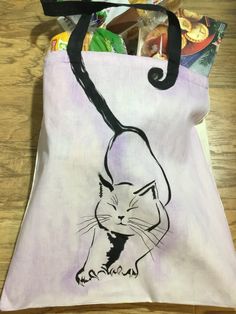 a bag with a drawing of a cat on it