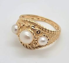 Please Read Below Prior To Purchasing;  Antique 14k Yellow Gold Unique Pearl Ring Size-6 *Approx. Size: 6 *Condition: Good condition with normal wear, Has some scratches & may need cleaning.              *Weight: 3.8g *Band Width: 2.0mm *Approx. Pearl Size: 4.09-5.9mm *Stamped-14k   6  IwI  -Ring Size and Stone Size are listed as approximate due to the fact that there is potential of these 2 items not being exact. I do provide a photo with the ring on the sizer for you to decide. A caliper is us Yellow Gold Oval Jewelry With Decorative Band, 14k White Gold Jewelry With Decorative Band, Oval Yellow Gold Jewelry With Decorative Band, Decorative Oval Yellow Gold Jewelry, 14k Gold Round Jewelry With Decorative Band, 14k Gold Jewelry With Decorative Band, Classic White Jewelry With Decorative Band, Elegant Wedding Ring With Hallmark, Classic 14k Gold Jewelry With Hallmark