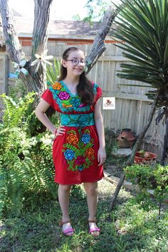 "Beautiful & Authentic Mexican Fiesta Woman's Dress, very fresh and light weight made with cotton blend fabric. All embroidered work is Handmade, just gorgeous and unique.... BELT IS NOT INCLUDED, if you wish to purchase belt please follow this link: https://www.etsy.com/listing/507922068/solid-adjustable-waist-belt?ref=shop_home_active_1&crt=1 MEASUREMENTS: * Coral - 23.5\" long (shoulder to hem), 20\" wide (underarm to underarm) * Black - 32\" long (shoulder to hem), 20\" wide (underar Folk Style Cotton Dress With Embroidered Neckline, Folk Style Embroidered Cotton Dress, Multicolor Cotton Dress With Embroidered Neckline, Red Floral Embroidered Cotton Dress, Spring Cotton Dress With Embroidered Border, Red Cotton Dress With Floral Embroidery, Short Sleeve Cotton Dress With Multicolor Embroidery, Festival Cotton Dress With Embroidered Border, Cotton Festival Dress With Embroidered Border