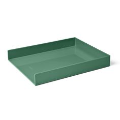 an empty green tray on a white background