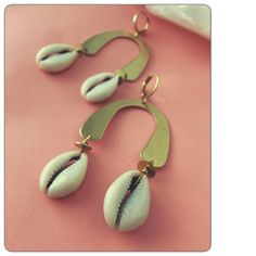 "Tiktok promotion...small batch special price - regularly $36 Sun catching, dangle, *brass *cowry shells solid brass (polishable like silver, naturally nickel-free) Total length: 2.25 long x 1.5\" wide Moveable Want a bit smaller design? Shop here: https://www.etsy.com/shop/StudioLaTouche?ref=seller-platform-mcnav&search_query=modern+earrings Visit me on facebook and 'like' my page for updates on new pieces, contests and other fun stuff like FREE SHIPPING!* :':..:':..:':..:':..:':..:':..:':..:'. Earthy Earrings, Gold Star Earrings, Cowry Shell, Simple Hoop Earrings, Oversized Earrings, Sleeper Earrings, Small Gold Hoops, Tiny Hoop Earrings, African Earrings