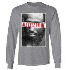 Tupac fans will love this All Eyes On Me album graphic long sleeve tee. Tupac fans will love this All Eyes On Me album graphic long sleeve tee. Crewneck Long sleevesFABRIC & CARE Cotton Machine wash Imported Size: XL. Color: Grey. Gender: male. Age Group: adult. Material: Cotton Blend. Fan Apparel Long Sleeve Relaxed Fit T-shirt, Fall Long Sleeve T-shirt With Front Print, Band Merch Long Sleeve Tops With Graphic Print, Long Sleeve Screen Print Fan Apparel Top, Fan Apparel Graphic T-shirt For Fall, Fan Apparel Graphic Print T-shirt For Fall, Fall Fan Apparel T-shirt With Graphic Print, Fall Fan Apparel Long Sleeve Tops, Winter Graphic Long Sleeve Top