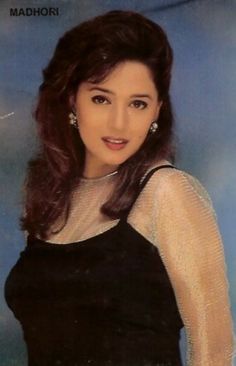 an old photo of a woman with long hair and wearing a black dress in front of a blue background