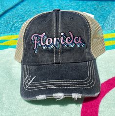 a black hat with the word florida written on it Black Distressed Hat With Curved Visor, Black Distressed Visor Hat, Distressed Curved Bill Hat For Baseball Season, Distressed Black Snapback Baseball Cap, Distressed Trucker Hat With Curved Brim, Distressed Trucker Baseball Cap, Distressed Trucker Hat With Curved Bill For Baseball Season, Distressed Curved Bill Trucker Hat For Baseball Season, Distressed Trucker Hat With Curved Brim For Summer