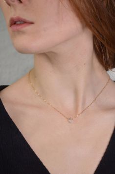 "Raw Diamond Necklace,Delicate Diamond Choker,Minimalist Bridal,Crystal Necklace,Christmas Gifts for her,Crystal Choker, Gorgeous Raw Herkimer Diamond Quartz Crystal (USA). The natural raw crystal is can be combined with a 14k gold filled, 14K Rose Gold or Sterling silver chain. This dainty raw Diamond would make a beautiful and unique gift for a birthday, wedding, anniversary, Christmas, Mother's Day, graduation, thank you gift or just a gift to yourself. It is suitable for both day and evening Tiny Diamond Necklace, Raw Diamond Necklace, April Birthstone Necklace, Diamond Choker, Les Chakras, Diamond Quartz, Tiny Diamond, Crystal Choker, Raw Diamond