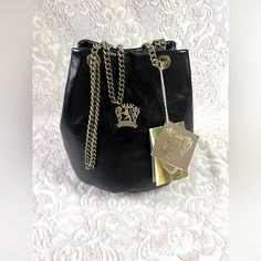 :.: `. Pratesi Firenze Black Leather Chain Italy Bucket Style Handbag - Brand New With Tags! * Pratesi Firenze Bucket Bag New With Tags!! Style: [Bne159] - Bruce Black 100% Genuine Leather Interior Features Brown Satin Lining Snap Closure Rustic Gunmetal/Bronze Hardware Measurements: 9" W X 8.5" H X 6.5" D Strap: 11” Drop / 22” Longest Drop Original Dust Bag Included! Can Be Worn As A Bucket Bag/Shoulder Bag Or Crossbody Purse! Handmade In The Florence Region Of Italy Crafted By Master Artisans Bucket Bag With Gold-tone Hardware For Gift, Elegant Leather Bucket Evening Bag, Gift Shoulder Bag With Gold-tone Hardware, Formal Leather Bucket Evening Bag, Luxury Bucket Bag With Adjustable Strap As Gift, Elegant Party Bucket Bag With Adjustable Strap, Elegant Soft Leather Bucket Bag, Formal Bucket Bag With Chain Strap, Luxury Black Bucket Bag As Gift