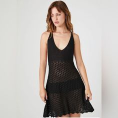 A Sheer Crochet Mini Dress Featuring A V-Neckline, Y-Back With Knotted Detail, Bust Lining, Scalloped Handkerchief Hem, And Flowy Silhouette. - Layering Garments Not Included. Fitted V-neck Crochet Summer Dress, Chic V-neck Crochet Dress For Day Out, Fitted Crochet Dress For Summer Nights Out, Chic Summer Crochet Dress For Night Out, Black V-neck Crochet Dress For Summer, Casual V-neck Crochet Dress For Party, Stretch Crochet V-neck Dress For Vacation, Summer V-neck Crochet Dress For Party, Summer Crochet Mini Dress For Night Out