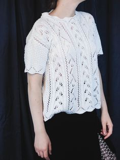 "80s/90s very cute vintage short sleeve sweater top in white knit, a perfect summer cottagecore sweater top Size L / M , or wear it as an oversize. Great vintage condition, no flaws, no stains, clean and ready to wear. Model in the photo is an EU 38 size (S/M) ● Era : late 80s/early 90s ● Label : Berkertex ● Fabric composition % : no tags but surely cotton by texture and weight ● Size on tag : no size tag ● How it fits : soft and nice cotton knit in white ● Condition : very good vintage conditio White Cable Knit Short Sleeve Top, White Short Sleeve Cable Knit Top, Spring Short Sleeve Cable Knit Tops, Short Sleeve Cable Knit Sweater For Spring, Spring Cable Knit Short Sleeve Tops, Cable Knit Short Sleeve Top, White Crew Neck Crochet Knit Top, White Knitted Short Sleeve Sweater, White Crew Neck Crochet Top