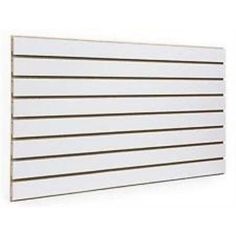 a white paneled wall with horizontal lines on it's side and the bottom