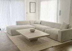 All White Living Room, Fluffy Couch, Dark Wood Flooring, Travertine Bathroom, Modern Apartment Living Room, Casa Clean, Travertine Coffee Table, Apartment Living Room Design, Dream Apartment Decor