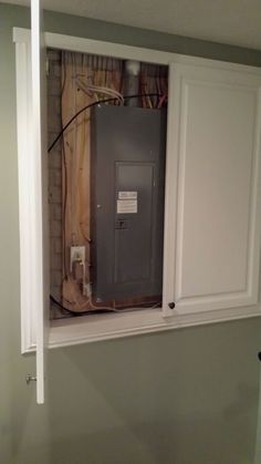 an electrical box in the corner of a room