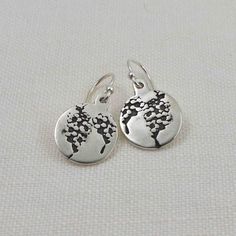 Cherish the memories of those you hold dear with these handcrafted Sterling Silver Forget Me Not Flower Earrings. Featuring an artist-original engraving of the delicate forget me not flower, these earrings are more than just jewelry - they are a heartfelt symbol of remembrance. A black patina enhances every detail of the design, bringing the flower's beauty to life. The asymmetrical heart earrings measure approximately 7/16" wide; the circle earrings measure approximately 1/2" and the rectangula Fingerprint Ring, Handwriting Bracelet, Rectangular Earrings, Pet Keepsake, Forget Me Not Flower, Handwriting Jewelry, Childrens Artwork, Pet Memorial Jewelry, Fingerprint Jewelry