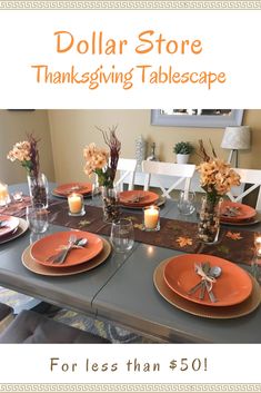 a table set for thanksgiving dinner with orange plates and silverware, candles and flowers