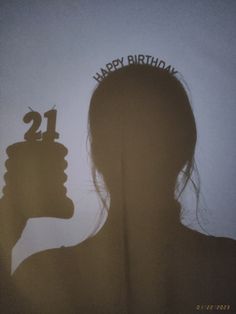 a woman's silhouette with the words happy birthday written on it