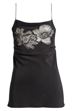 A deeply dipped cowl back brings flirty energy to this silk top with a vintage-inspired lace appliqué across the front. 24" center front length (size Medium) Ties at back Boat neck Adjustable tie straps 100% silk Dry clean or hand wash, dry flat Imported Black Silk Camisole Top, Fitted Silk Embellished Tops, Black Fitted Top With Cowl Back, Chic Floral Embroidered Top For Evening, Chic Floral Embroidery Top For Evening, Chic Evening Tops With Floral Embroidery, Silk Camisole Evening Top, Silk Cami Top For Evening, Silk Camisole Top For Evening