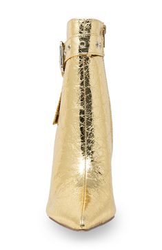 Gleaming grommets add street-savvy edge to this sleek pointed-toe bootie lofted by a sky-high stiletto heel. 4" heel 6" shaft; 9 1/2" calf circumference Synthetic upper, lining and sole Imported Elegant Gold Boots Medium Width, Luxury Gold Glamorous Boots, Designer Gold Pointed Toe Boots, Glamorous Gold Ankle Boot Heels, Gold Ankle-high Boots With Reinforced Heel, Glitter Boots, Sky High, Chloe, Stiletto Heels