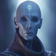 an alien man with blue skin and white makeup