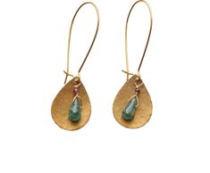 Experience the allure of green onyx and the artisanal charm of hammered leaf findings in earrings that reflect elegance and natural beauty. Whether you're attending a special event or looking to add a touch of sophistication to your everyday look, these earrings make a statement of refined style. Order now to own a piece that captures the essence of elegance and creativity. The hammered leaf shape findings add an organic touch, evoking the beauty of nature. The combination of vibrant green onyx Hand Forged Green Earrings For Gift, Hand Forged Green Teardrop Jewelry, Green Hammered Bohemian Jewelry, Green Hand Forged Brass Earrings, Hand Forged Green Drop Earrings, Elegant Green Hammered Earrings, Green Teardrop Brass Jewelry, Bohemian Teardrop Jade Earrings, Green Artisan Dangle Earrings