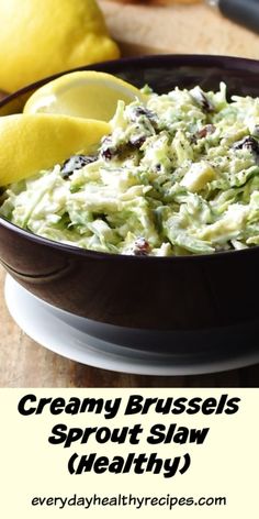 Side view of creamy brussels sprout salad in brown bowl with lemons in background. Creamy Brussel Sprouts, Brussels Sprout Slaw, Creamy Lemon Dressing, Brussel Sprout Slaw, Shaved Brussel Sprout Salad, Shredded Brussel Sprout Salad, Tasty Salads, Shaved Brussel Sprouts