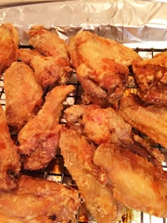 chicken wings on a grill in an oven