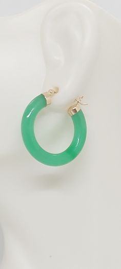 GREEN Jade Hoop Earrings in 14K Yellow Gold. 24 millimeters. Green Jade 14k Yellow Gold Hoop Earring. JADE Lover. Product Info: -Earring diameter: 24 millimeters -Metal: 14K. -Stone: Green Jade. -Colors: Green. -Finish: 14k Yellow gold. -Stone dimension: 4mm -Nice Gift box is included. Green 14k Gold Hoop Earrings, Green Jade Hoop Jewelry, Green Pierced Hoop Earrings For Anniversary, Green Jade Hoop Earrings, Green Small Hoop Earrings Fine Jewelry, Green 14k Gold Fine Jewelry Hoop Earrings, Green 14k Gold Hoop Earrings Fine Jewelry, Green Pierced Hoop Earrings, Small Green Pierced Hoop Earrings