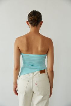 Slip into color in the Callie Asymmetrical Twist Front Tube Top for a splash of Summer freshness! This crop top features a twist front detail, asymmetrical hem, and tube top fit! Available in Bright Yellow and Aqua Blue; pair this top with your go-to denim to polish off the outfit!Details: 95% Polyester, 5% Spandex Lots of Stretch Hand Wash Cold/ Line Dry