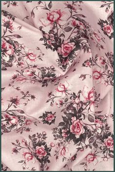 a pink and black floral print fabric