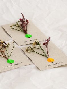 four small cards with flowers on them